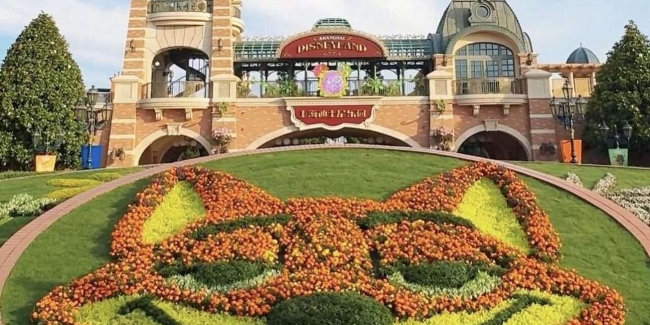 “Blooming Delight: Nick Wilde Welcomes Guests at Shanghai Disneyland with Floral Display”